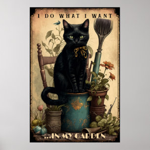 Poster Chat noir assis dans le jardin