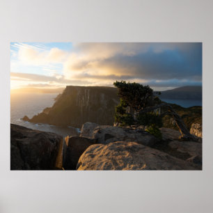 Poster Coucher de soleil doré sur les plus hautes falaise