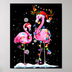 Poster Deux flamants avec chapeau de Père Noël et lumière
