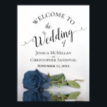 Poster Elegant Dusty Steel Blue Rose Wedding Welcome<br><div class="desc">Introduce your wedding celebration in style with this stunning sign. Its design is both sophisticated and understated, with delicate script calligraphy and a graceful long-stemmed dusty steel blue colored rose mirrored in a pool of water, complete with waves and ripples. This exquisite piece is the perfect touch to greet your...</div>