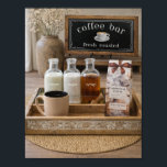 Poster Farmhouse Coffee Bar Still Life Decor |<br><div class="desc">Create a warm and inviting coffee corner with this cozy farmhouse coffee bar still life artwork. Featuring a rustic tray, glass bottles for cream, sugar, and syrup, a fresh cup of coffee, and a charming coffee bar sign, this piece captures the relaxed comfort of a home coffee station. Perfect for...</div>