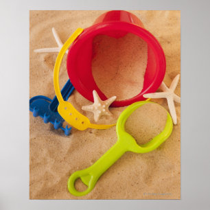 Poster Fermez-vous des jouets sur le sable