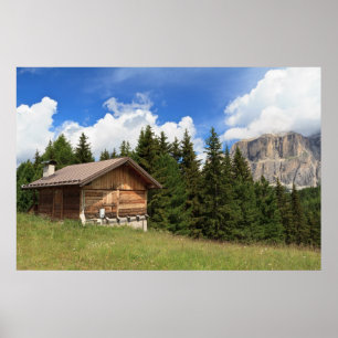 Poster grange sur les pâturages alpins