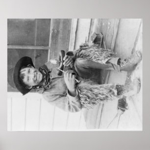 Poster Jeune garçon habillé comme cowboy avec des jouets