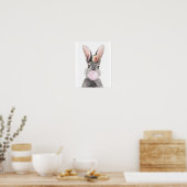 Poster Lapin gris soufflant une fleur d'anémone en gomme (Cuisine)