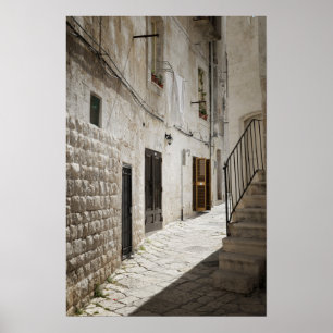 Poster Lave-linge suspendue à sécher dans une ruelle en I