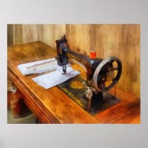Poster Machine à coudre avec le fil orange
