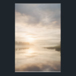Poster Misty Lake Sunrise Golden Reflection<br><div class="desc">Soft golden sunlight pierces through thick morning mist over a calm lake, creating a luminous path of reflection across the water. Tall reeds line the shore while distant trees fade into the haze, and the sky blends warm peach and rose tones into pale blue-gray. The composition radiates profound stillness, gentle...</div>