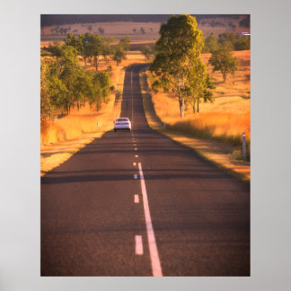 Poster On the Road Again a Long Stretch of Road on a Wall
