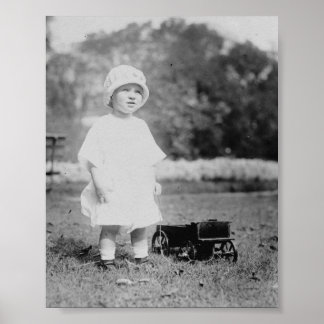 Poster Petite fille avec Wagon de jouet
