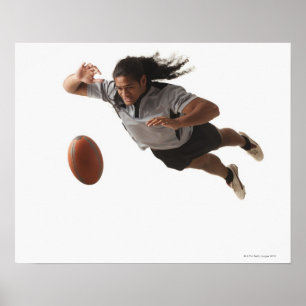 Poster Plongée masculine de joueur de rugby pour la boule