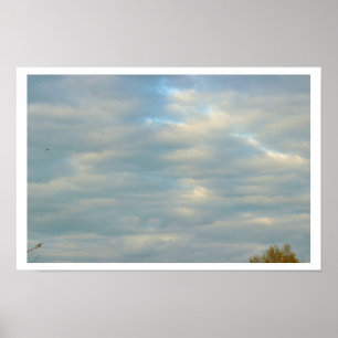 Poster Puits de soleil à travers l'affiche des nuages