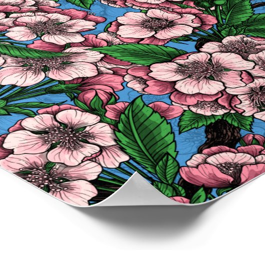 Poster Rameaux bleus dans le cerisier en fleurs sur le bl (Coin)