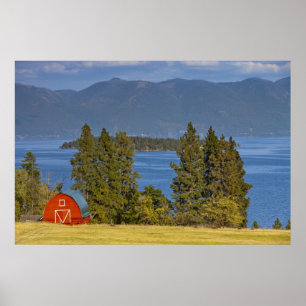 Poster Red barn sits along scenic Flathead Lake near
