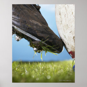 Poster Rugby player kicking ball off tee, close up of