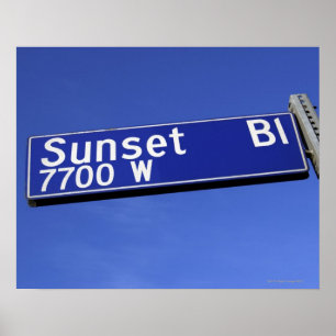 Poster Signe de boulevard de coucher du soleil contre un