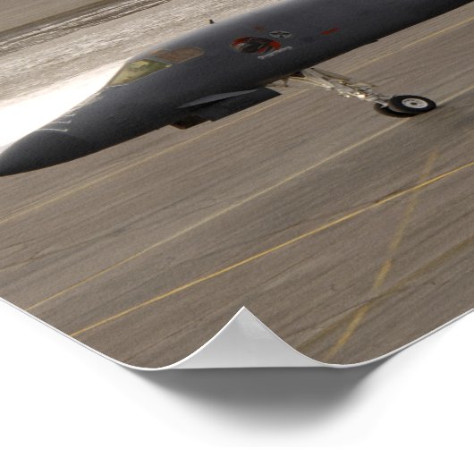 Poster Un Lancer B-1B effectue une touche et va (Coin)