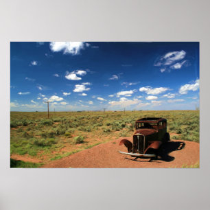 Poster Voiture rouillée dans la peinture de désert