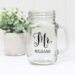 Pot Mason M. Rustic Black Script Mariage personnalisé<br><div class="desc">Le design personnalisé de bocal en mariage en maçon comporte M. en écriture noire avec du texte personnalisé pour le nom de famille du marié. Design recto-verso. Magasinez notre magasin pour la coordination de la conception de bocaux Mme mason.</div>