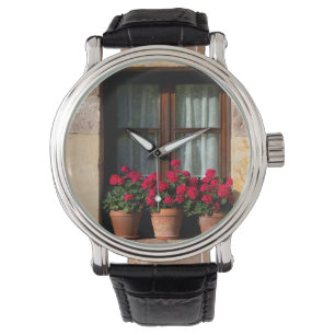 Poten voor bloemen in het dorp horloge