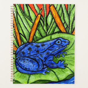 Pots de grenouille bleu vibreux sur des Plantes de