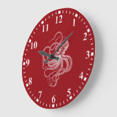 poulpe blanche sur une grande horloge rouge foncé (Angle)