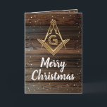Pour Fêtes Annuelles Cartes de Noël maçonniques en bois rustique<br><div class="desc">Chaleureux et accueillant bois rustique cartes de Noël maçonniques en or que vous pouvez personnaliser! Le design unique et vintage représente un carré doré et un symbole de boussole de la franc-maçonnerie sur d'élégantes planches rustiques en bois foncé. La chute de neige blanche borde ces cartes de fin de année...</div>