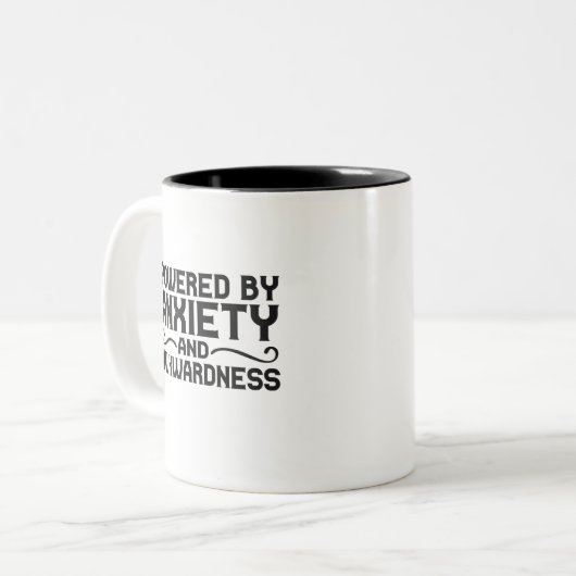 Powered By Anxiety and Awkwardness Funny Introvert Tweekleurige Koffiemok (Voorkant links)