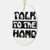 Praat tegen de hand keramisch ornament (Links)