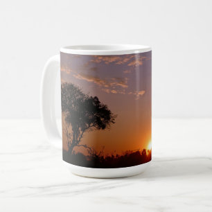 Prachtige zonsondergang  koffiemok