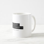 Précaution : Le bas sur la tasse de cuillères (Devant droit)
