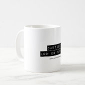 Précaution : Le bas sur la tasse de cuillères (Devant gauche)