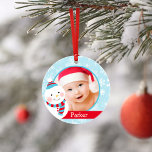 Premier Noël Baby Boy Snowman Photo personnalisée<br><div class="desc">Le 1er ornement de Noël du bébé comprend une photo personnalisée,  le nom et l'année de naissance du bébé avec un bonhomme de neige hivernal et un manchot mignon. Le design rouge,  bleu glacé,  turquoise et blanc présente un arrière - plan à motifs de flocon de neige hivernal.</div>