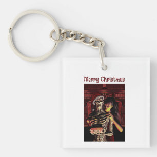 Prettig kerstfeest. Grappig skelet met vrouw Sleutelhanger