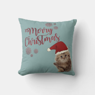 Prettig kerstfeest, kat met kerstmuts kussen