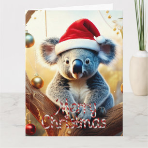 Prettig kerstfeest koala zittend in eucalyptus kaa kaart