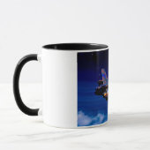 Prochaine tasse à la maison de bombardier (Gauche)