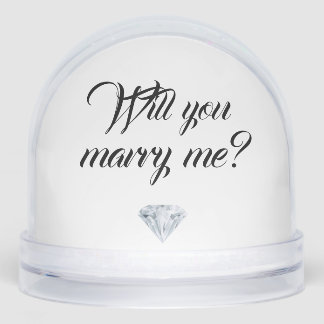 Projet de mariage sur le globe neigeux