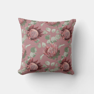 Protea vert et rose sur coussin d'accent rose