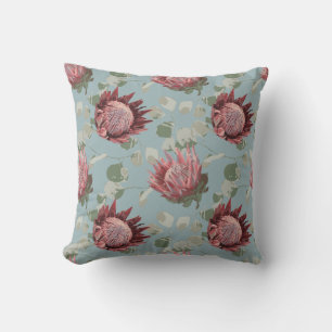 Protea vert et rose sur le Coussin bleu français