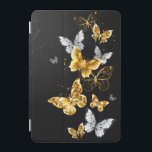 Protection iPad Mini Papillons blancs et dorés<br><div class="desc">Or,  bijoux et papillons blancs sur arrière - plan noir. Papillon doré.</div>