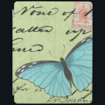 Protection iPad Papillon à ailes bleues sur carte postale Turquois<br><div class="desc">Cette carte postale turquoise porte un message de beauté. Un délicat papillon à ailes bleues repose sur la carte,  obscurcissant une partie du script qu'il contient. Cette impression de Vision Studio ferait un grand ajout à votre maison!</div>