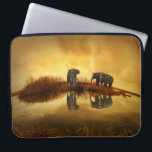 Protection Pour Ordinateur Portable Eléphants asiatiques en Thaïlande sous un coucher<br><div class="desc">Belle photo d'un groupe d'éléphants asiatiques pris en Thaïlande sous le soleil couchant. L'éclairage de cette photo crée une ambiance rétro vintage.</div>