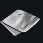 Protection Pour Ordinateur Portable Empreintes de neige<br><div class="desc">Une poussière de neige fraîche recouvre une allée noire avec des densités variables. Deux séries d'empreintes de démarrage noir commencent côte à côte en haut de l'image et divergent en approchant le spectateur dans cette photo verticale, noir et blanc. Un ensemble de pistes se dirige vers le coin inférieur gauche...</div>