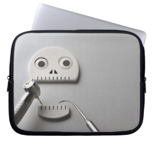 Protection Pour Ordinateur Portable Le squelette que le traitement dentaire est pris