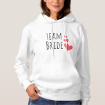 Pull À Capuche Épouse d'équipe<br><div class="desc">Design génial avec la citation "Team Bride" et trois coeurs rouges. Idée de tenue géniale et drôle pour une fête de bachelorette ou pour la fête de mariage.</div>
