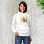 Pull À Capuche Style vintage Joyeux Noël<br><div class="desc">Une scène de noël vintage avec un arbre un bonhomme de neige et un renne. Ce design semble vraiment efficace sur ce Sweat - shirt à capuche féminin</div>