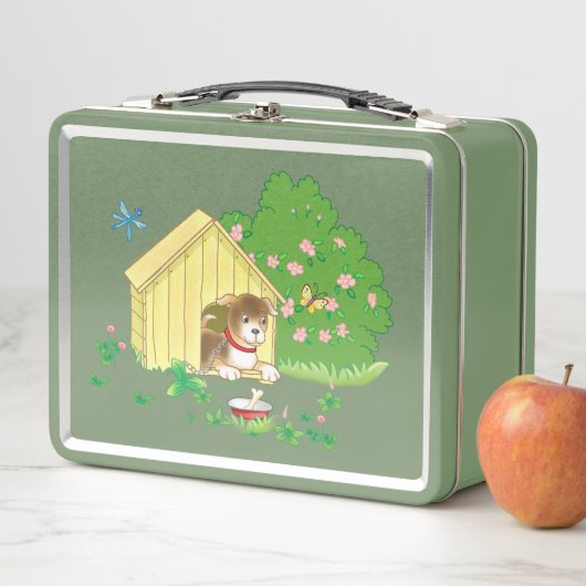 Puppy in een kennel en een bot in een kom (In situ)