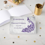 Purple Peacock Leaf Vine Mariage Livre d'or<br><div class="desc">Enregistrez les invités à votre grande journée avec un livre d'or Purple Peacock Leaf Vine Wedding Day. Le design du livre d'or est orné d'un arrière - plan gris clair avec un paon violet plein de vitamine, orné d'un motif de vigne à feuilles. Papier à lettres mariage supplémentaire disponible avec...</div>