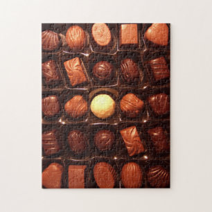 Puzzel die doos van chocoladesnoep kenmerken